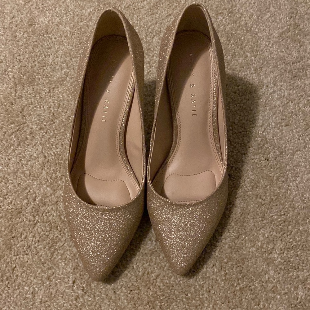Gold high heels. Worn once , size 8.5 like new